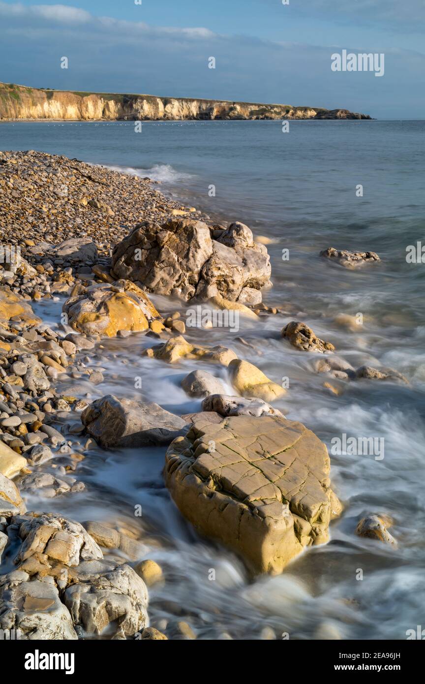 Water washing round boulders in Marsden Bay, South Shields, Tyne and Wear, England Stock Photo