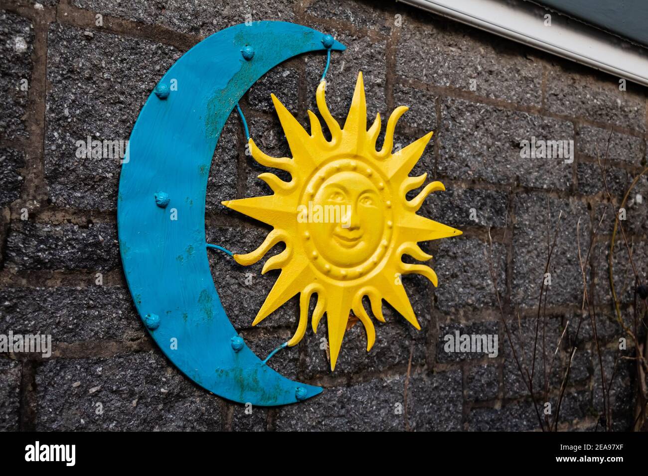 Sun and moon garden wall decoration Stock Photo