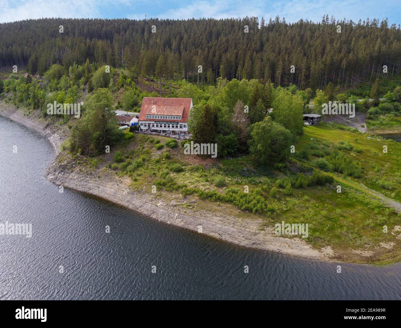 ALTENAU, LOWER SAXONY, GERMANY: Aerial view of Der Windbeutel-König restaurant at the Oker Dam, Harz mountains. Gastronomy specialized in cream puffs. Stock Photo