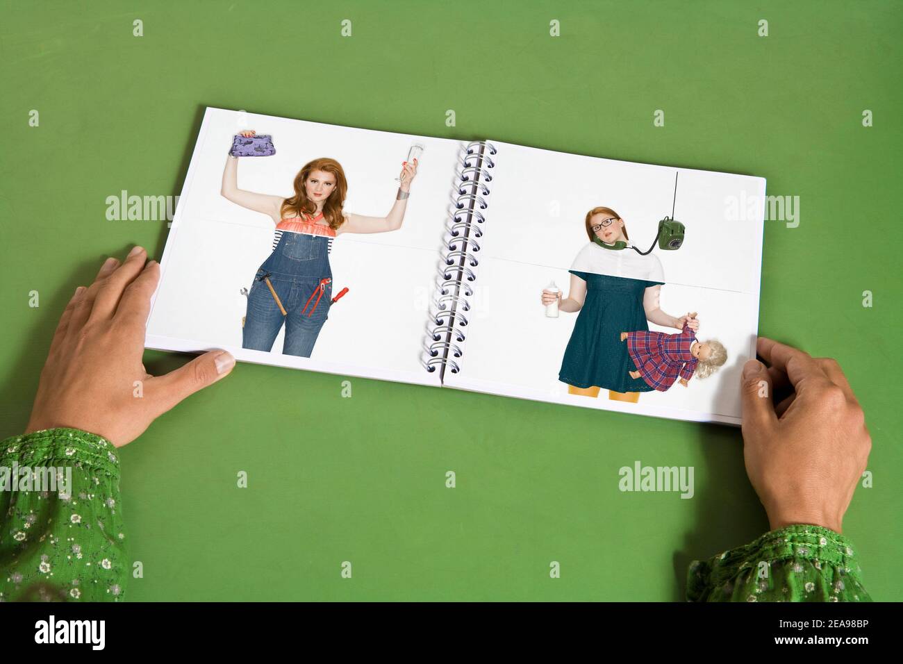 Woman's hands hold an open book in which Klip Klap photos of women in various roles can be seen, green table and green blouse, bleed, without a face Stock Photo
