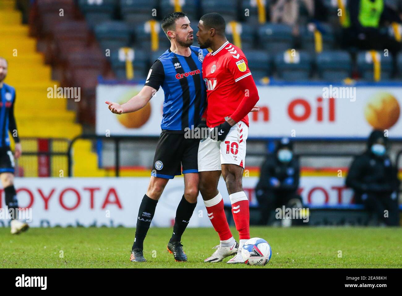 Tempers flare between Charlton Athletic's Chuks Aneke (right) and Rochdale's Eoghan O'Connell during the Sky Bet League One match at Crown Oil Arena, Rochdale. Picture date: Saturday February 6, 2021. Stock Photo