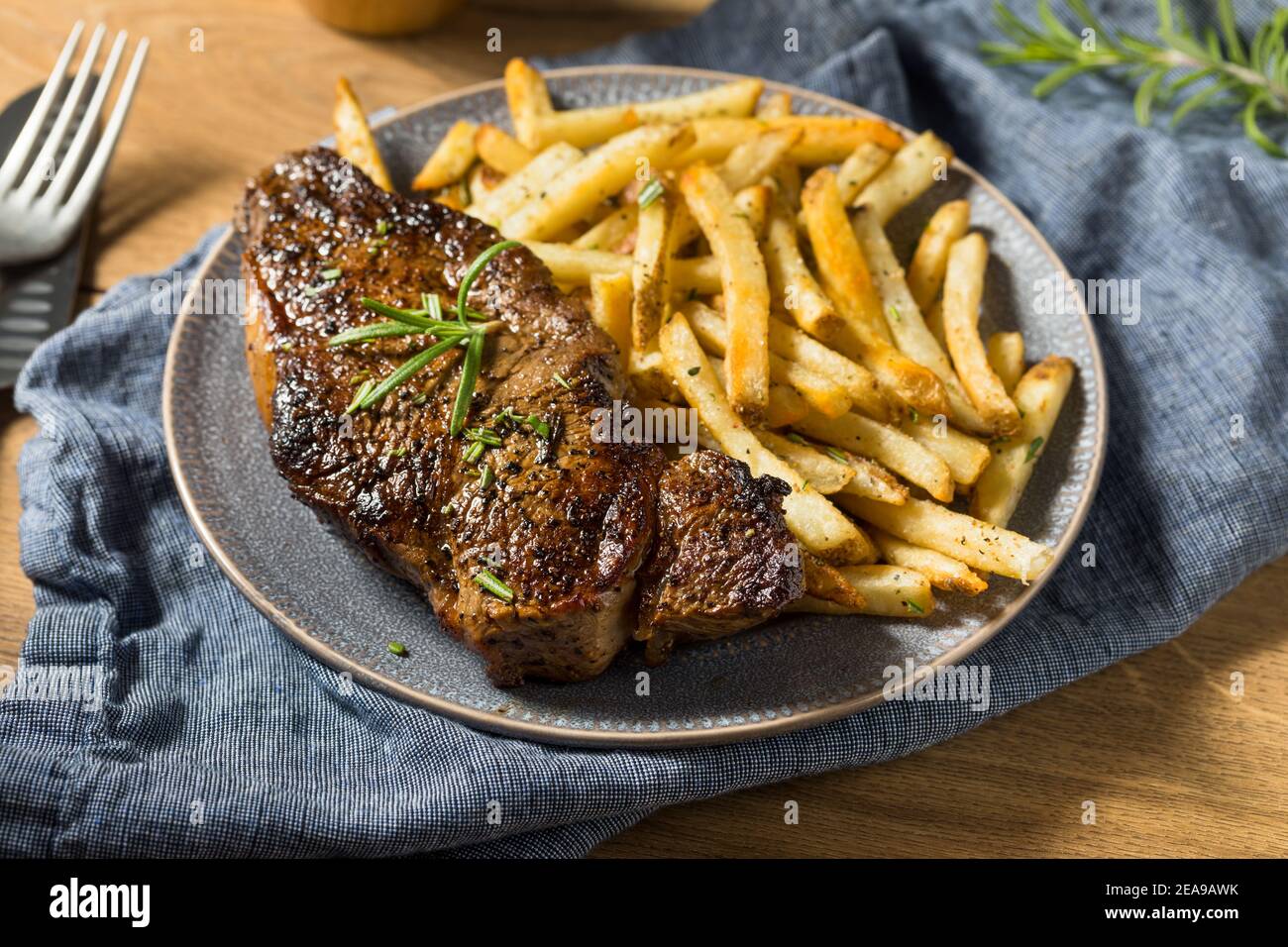 Homemade Rosemary Steak and French Fries with Salt Stock Photo Alamy