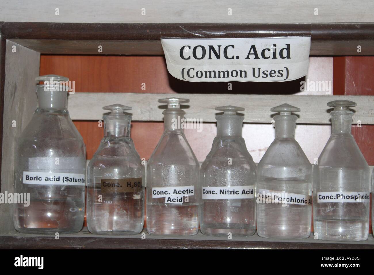 Bottles filled with concentrated acid Stock Photo