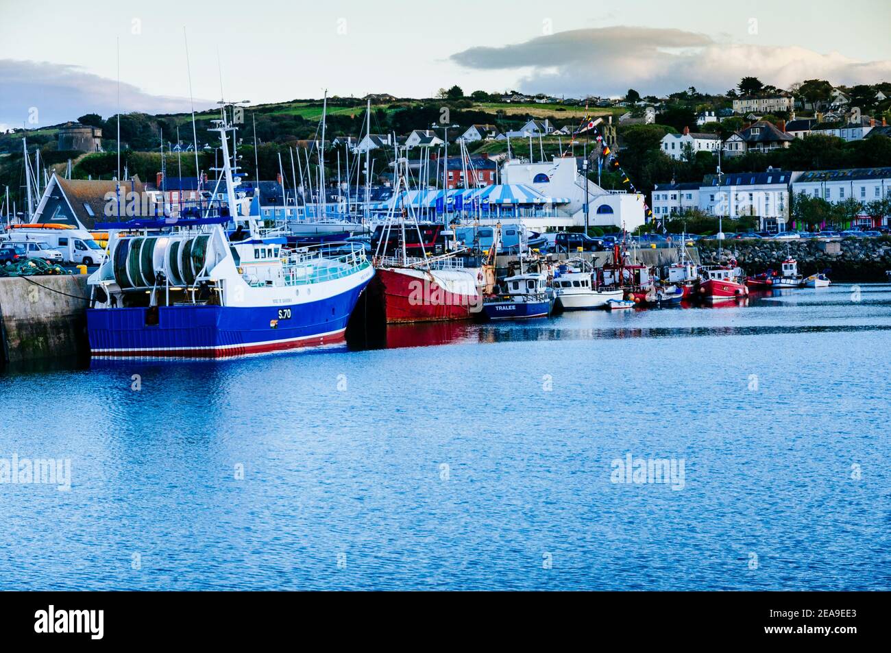 Fishing boats docked at the pier, Howth Fishery Harbour. Howth, County