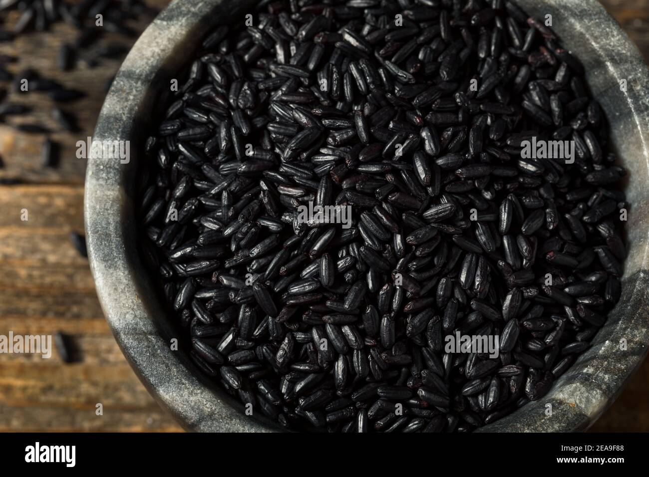 Dry Organic Asian Black Rice in a Bowl Stock Photo Alamy
