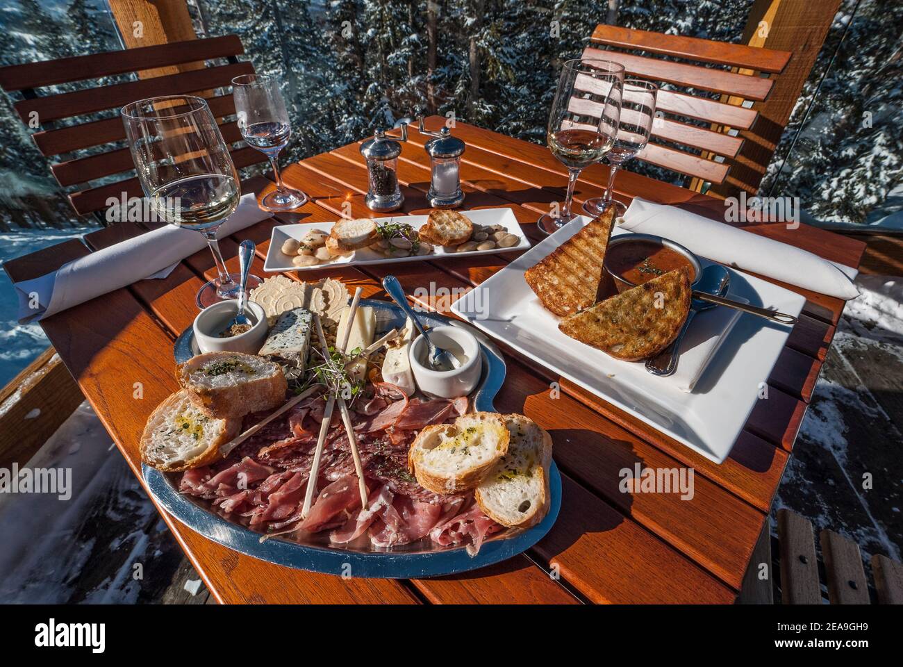 Lunch on the deck, Alpino Vino Wine Bar restaurant, Telluride Ski and Golf Resort, Telluride, Colorado. Stock Photo