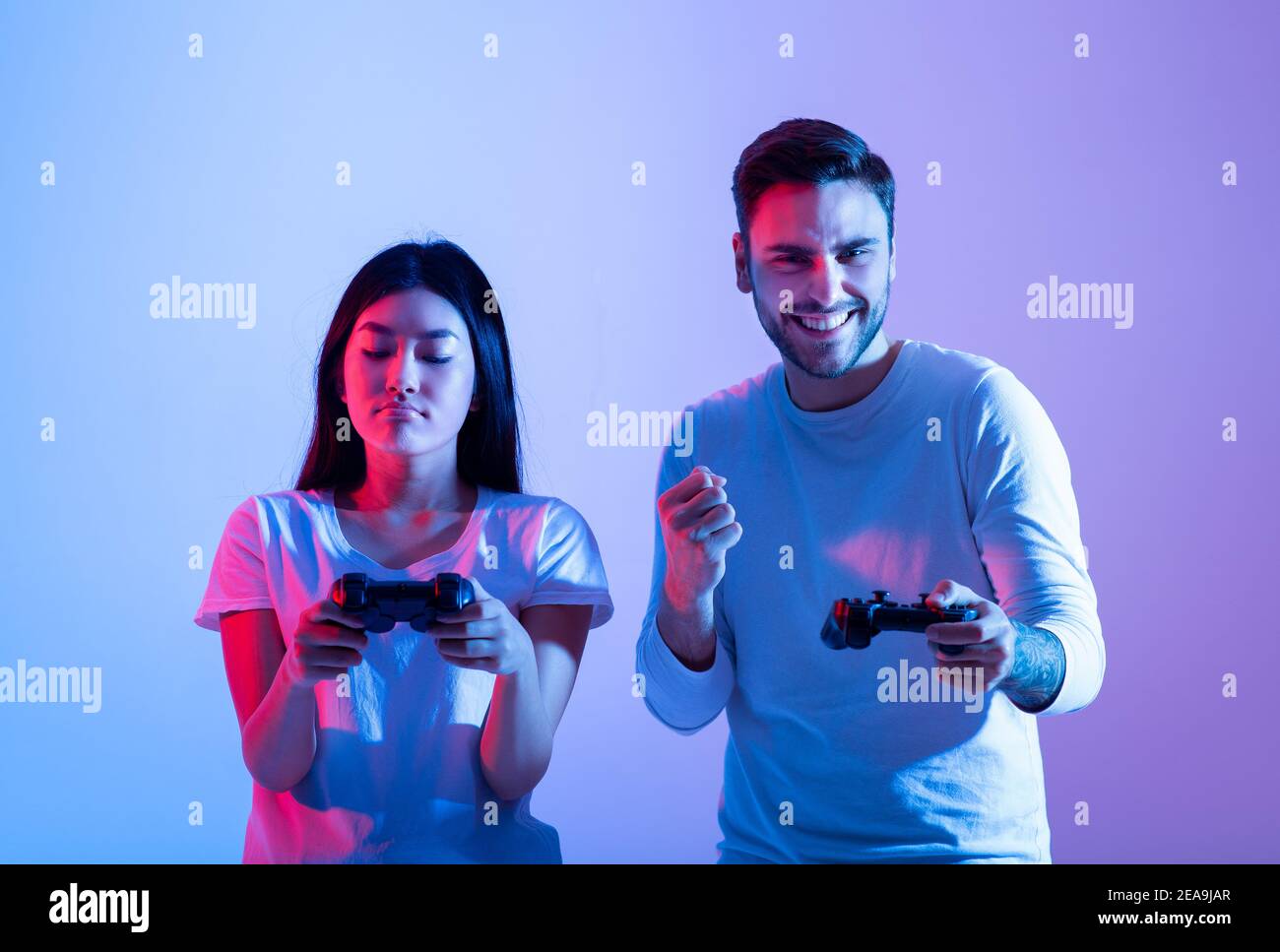 Fun Vs Winning Winning and losing, facial emotions and fun together Stock Photo - Alamy
