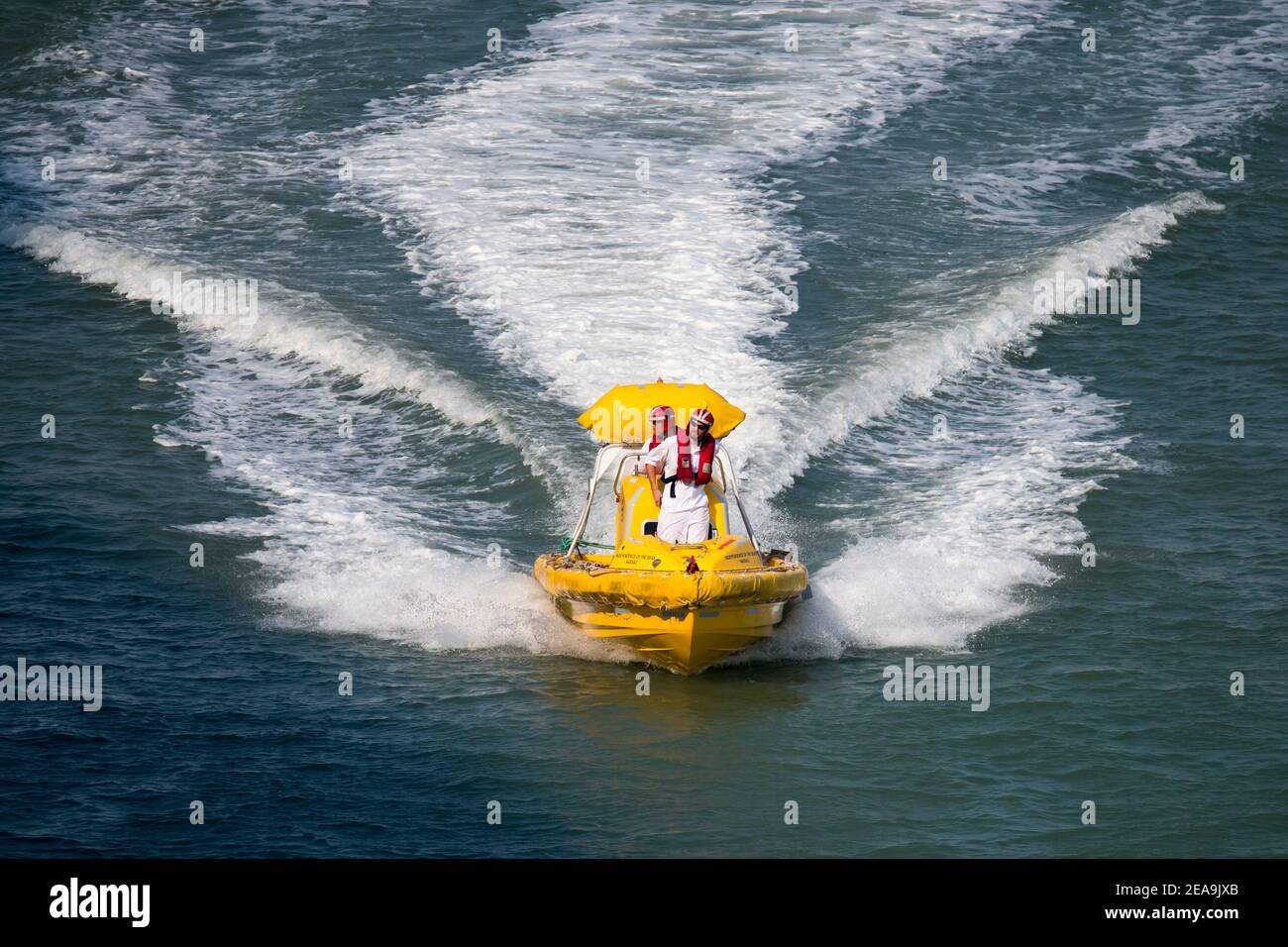A lifeboat from the Royal Caribbean International Independence of the Seas cruise ship during a training exercise in the water in Cádiz, Spain. Stock Photo