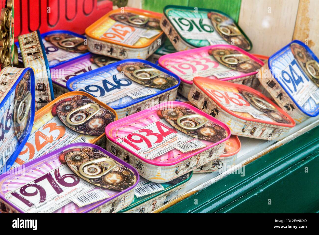 Portugal Porto store souvenir gift shop shopping sardine tins cans Sardinha Portuguesa local food years 20th century 1976 1934 1946 1916 1947 Stock Photo