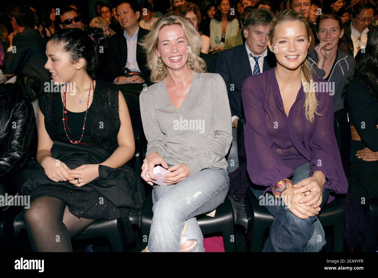 French actress Alysson Paradis, French TV reality 'La Ferme' contestant,  Celine Balitran and TV presenter Virginie Efira attend the Stella Cadente  Ready-to-Wear Spring-Summer 2006 fashion show at 'Le Carrousel du Louvre',  in