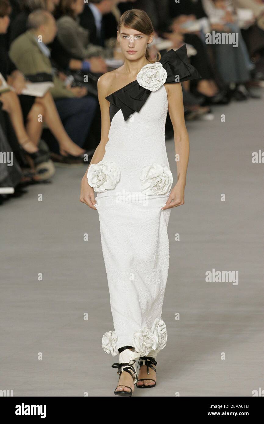 A model displays a creation by German fashion designer Karl Lagerfeld for Chanel  Ready-to-Wear Spring-Summer 2006 collection presentation at the 'Grand  Palais', in Paris, France, on October 7, 2005. Photo by  Nebinger-Orban-Zabulon/ABACAPRESS.COM