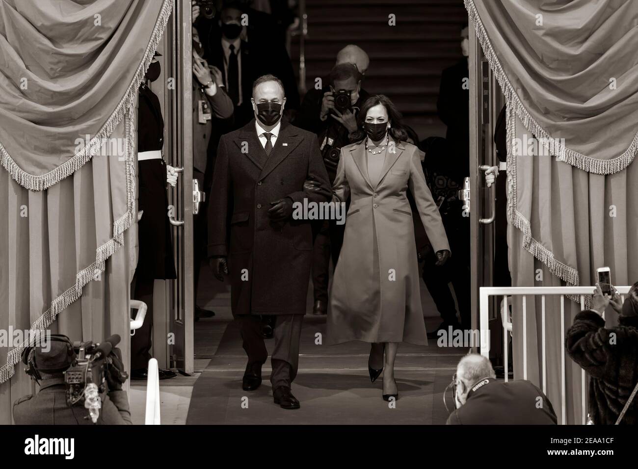 Vice President-elect Kamala Harris and her husband Mr. Doug Emhoff arrive to the inaugural platform for the 59th Presidential Inauguration Wednesday, Jan. 20, 2021, at the U.S. Capitol in Washington, D.C. (Official White House Photo by Chuck Kennedy) Stock Photo