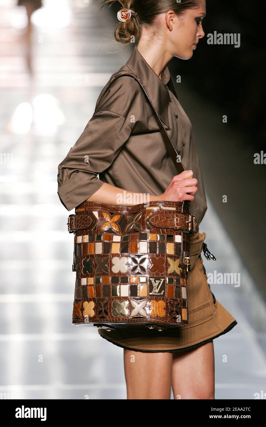 A model displays a creation by U.S. designer Marc Jacobs for French fashion  house Louis Vuitton during the presentation of its Spring-Summer 2006  ready-to-wear collection in Paris, France, on October 9, 2005.