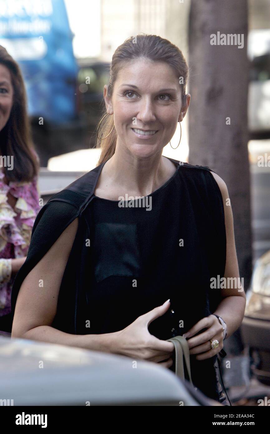 French Canadian singer Celine Dion, accompanied by her French producer's  wife Monique Coullier, makes her shopping in the luxury boutiques Chanel,  Dior and Baby-Dior on avenue Montaigne in Paris, France, on October