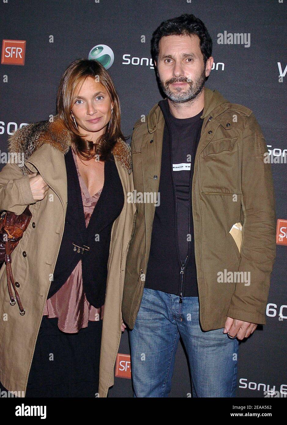FrenchTV presenter Axelle Laffont and her boyfriend Serge Hazanavicius attend the opening of Danish top model Helena Christensen's photo exhibition, 'An Eye for Beauty', held at the Galerie Diana Marquardt in Paris, France, on October 21, 2005. The pictures have been taken with a Sony Ericsson K750i mobile phone. Photo by Bruno Klein/ABACAPRESS.COM. Stock Photo