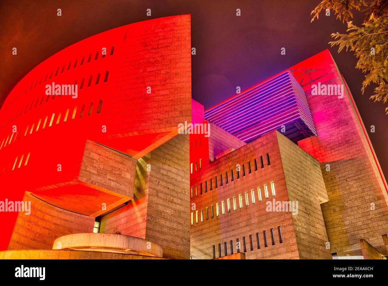 At night, Casino di Campione illuminated in red blue Stock Photo