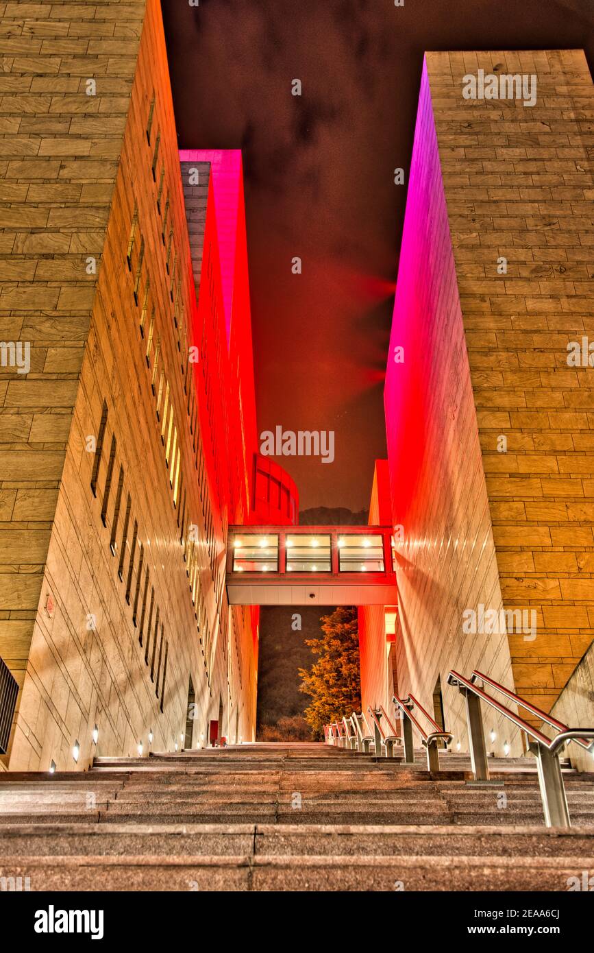 At night, Casino di Campione illuminated in red blue Stock Photo