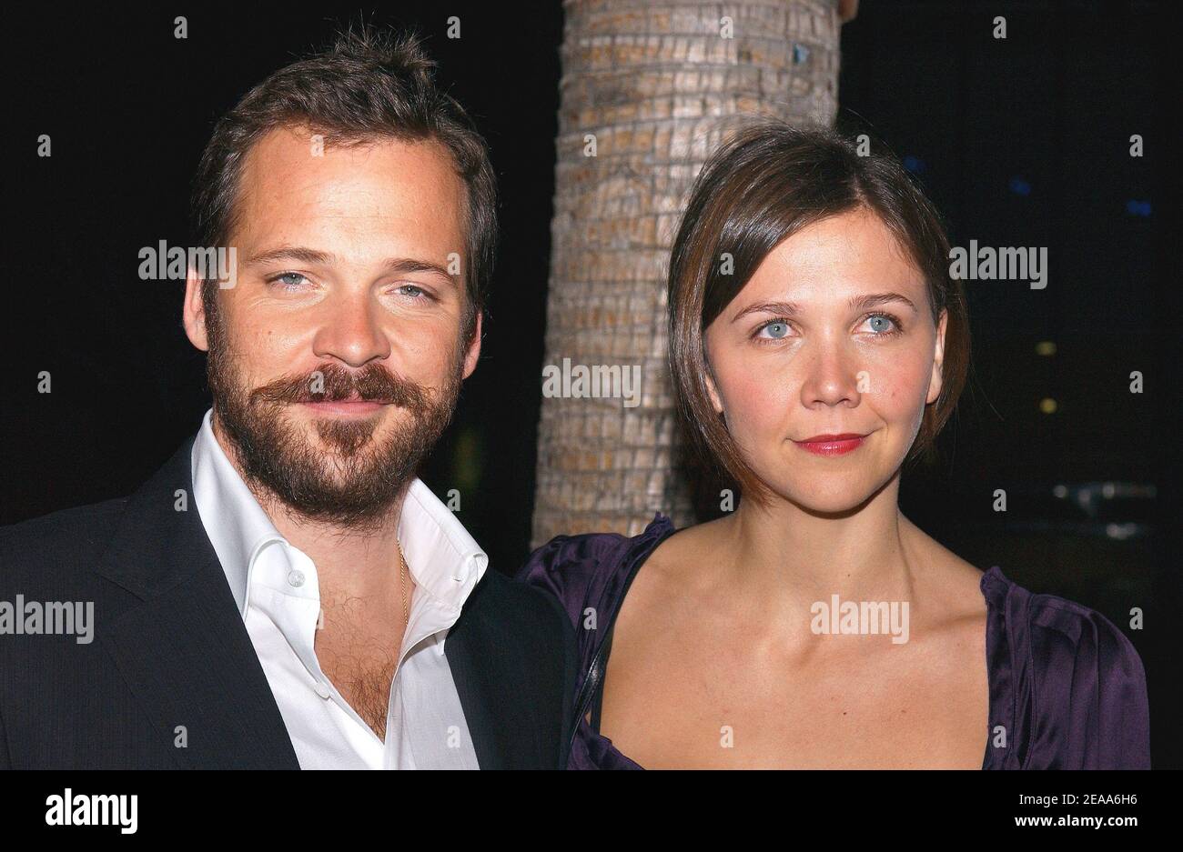 'Cast member Peter Sarsgaard and Maggie Gyllenhaal attend the world premiere of Universal Pictures ''Jarhead'' at the Arclight Hollywood. Los Angeles, October 27, 2005. Photo by Lionel Hahn/ABACAPRESS.COM' Stock Photo