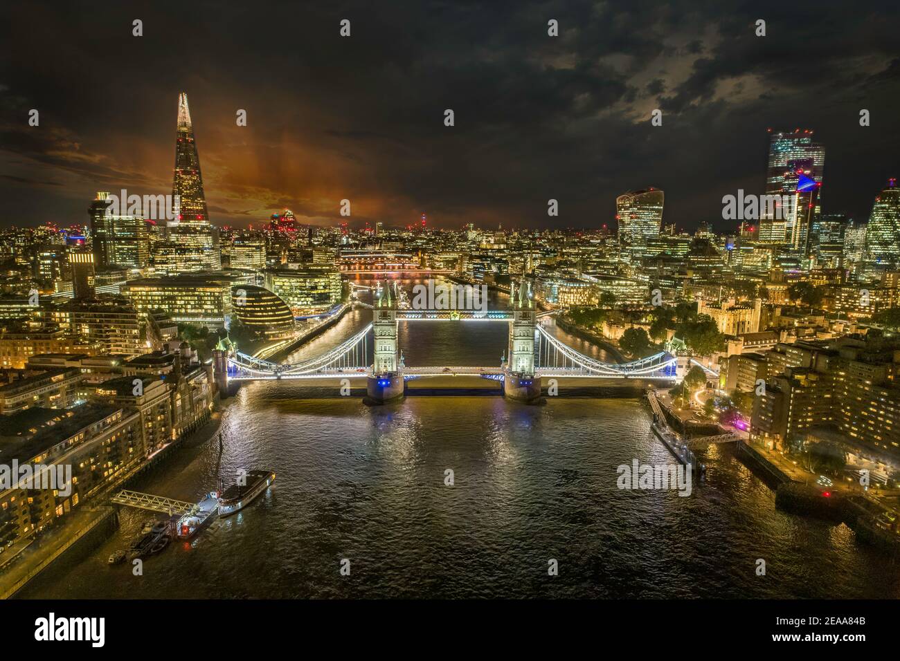 Tower Bridge, The Shard and London City Hall at Dusk Night over River Thames by drone wall art Stock Photo
