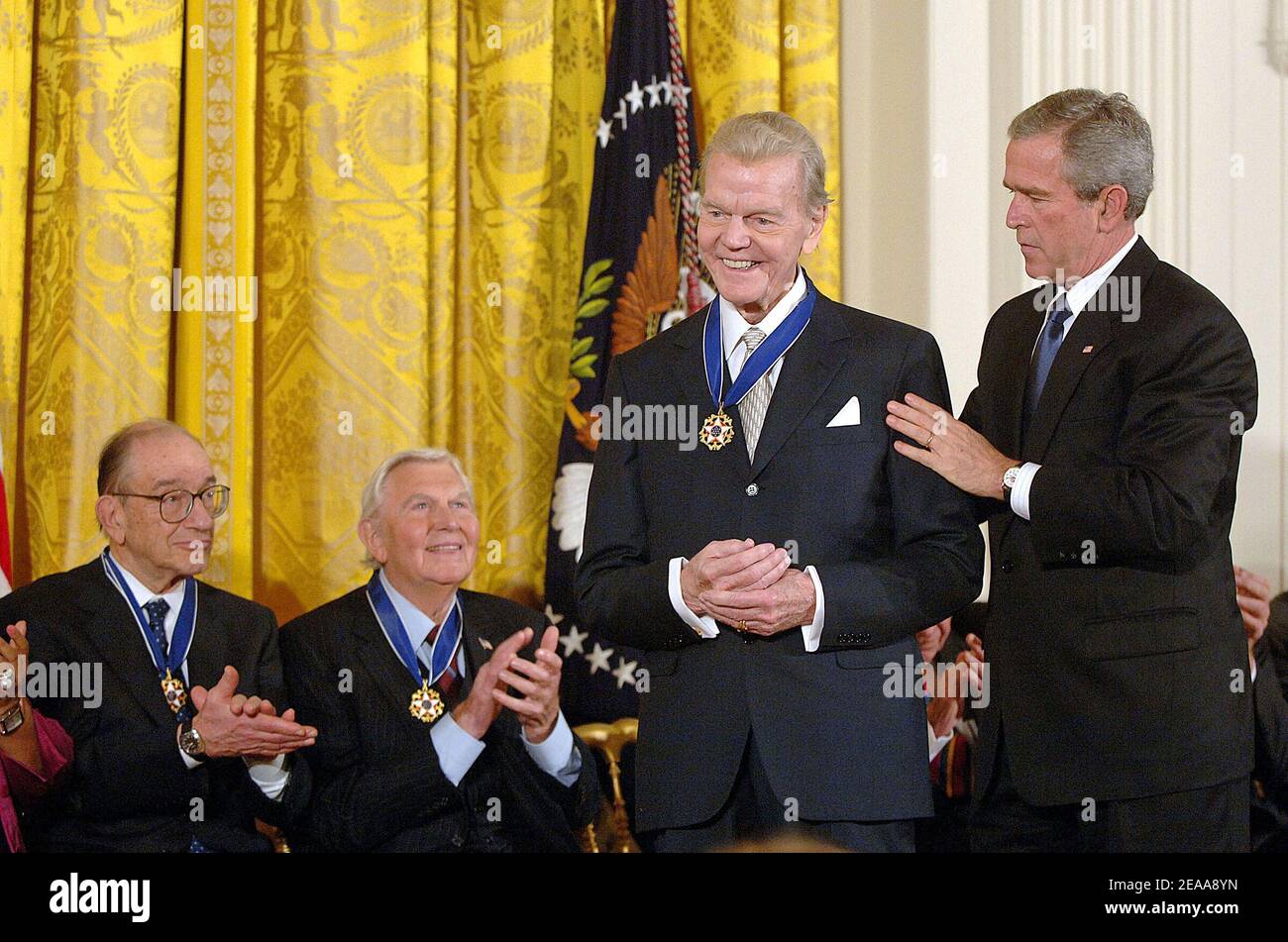 U.S President George W. Bush honors celebrities and personalities including  radio commentator Paul Harvey with the Presidential Medal of Freedom during  a ceremony at the White House in the East room in