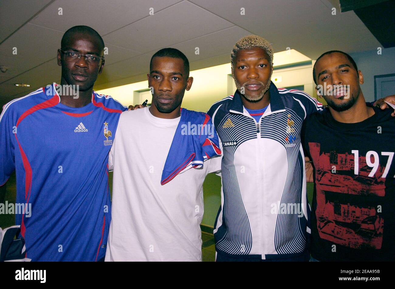 L-R) French national soccer player Lilian Thuram, singer Passy, national  player Djibril Cisse and singer Stomy Bugsy at the presentation of the  French national soccer team's new Adidas shirt for the 2006