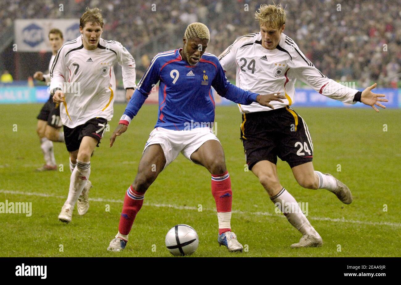 France's Djibril Cisse and Germany's Marcell Jansen during the friendly match between France (0) and Germany (0) at the Stade de France, in Saint-Denis, near Paris, France, on November 12, 2005. Photo by Nicolas Gouhier/CAMELEON/ABACAPRESS.COM Stock Photo