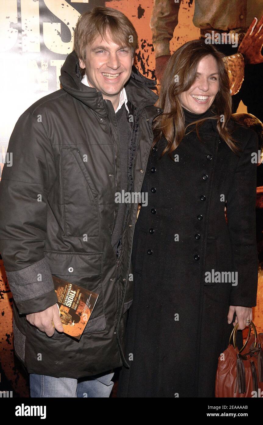 French humorist Didier Gustin and wife Stephanie attend the Premiere of  'Trois Enterrements' directed by Tommy Lee Jones at the UGC Normandy  Theatre on the Champs Elysees in Paris, France on November