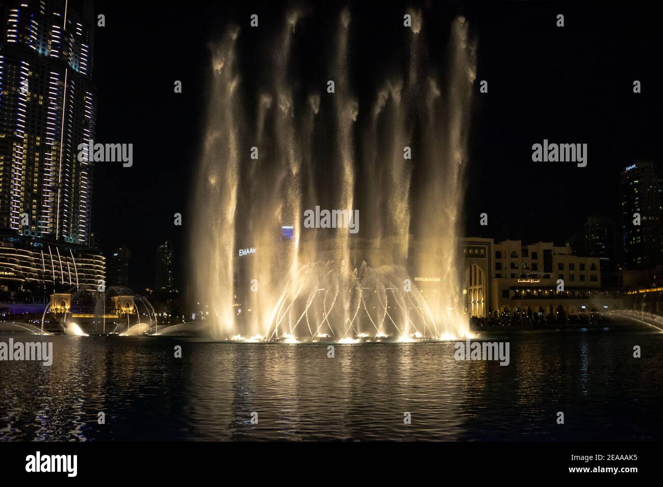 Dubai Fountain at night and Souk al Bahar, Dubai Mall, UAE Stock Photo