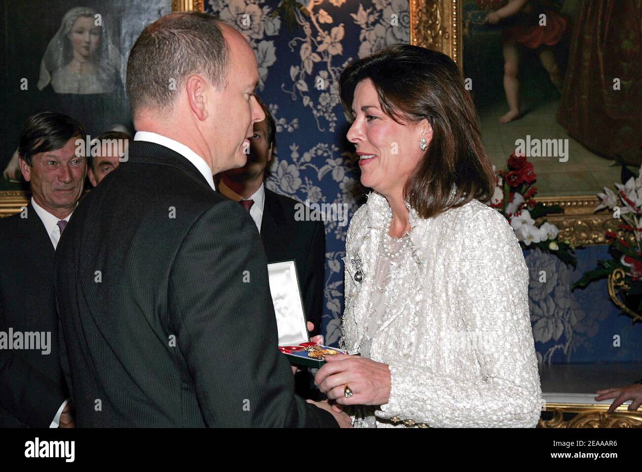Monaco Ruler Prince Albert II of Monaco giving the medal of the Cultural Order of ...
