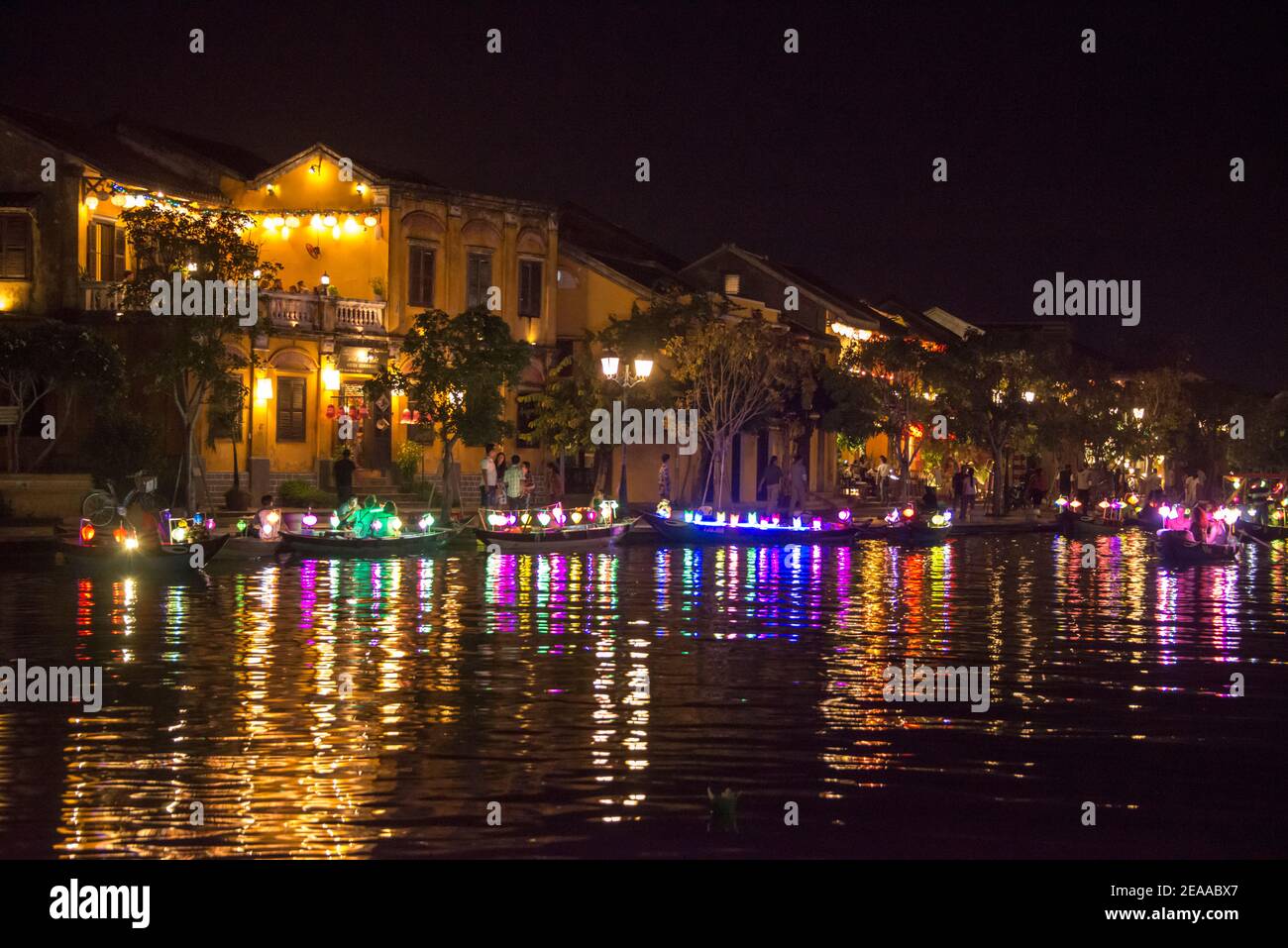 At night waterfront with reflection in Hoi An, Vietnam Stock Photo