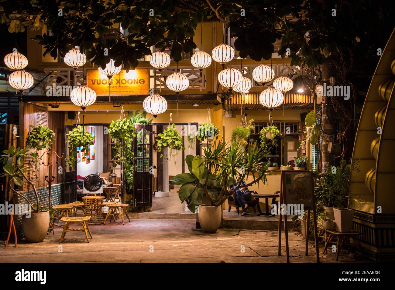 Nighttime restaurant with Chinese lanterns, Hoi An, Vietnam Stock Photo