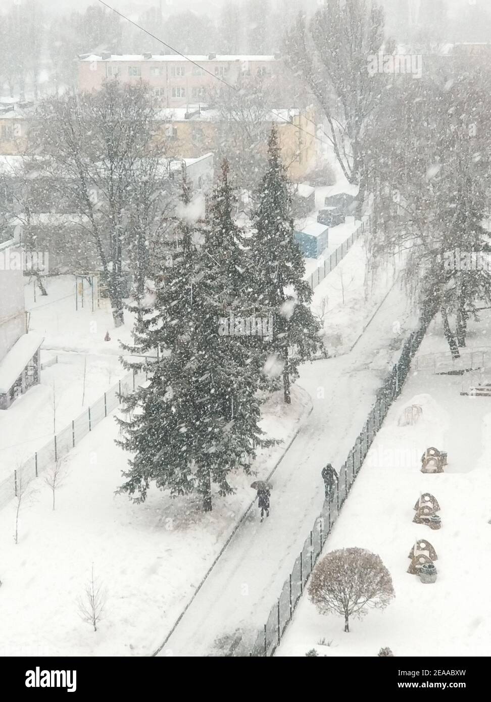 Winter landscape. The streets of a small town are covered with white ...