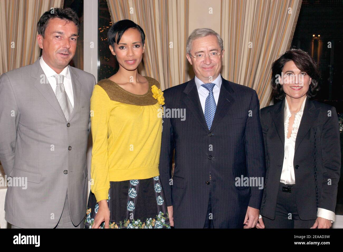 (L to R) Cartier shop manager Olivier Collignon, Former Miss France Sonia Rolland and Hotel Bristol Manager Jean Louis Souman, Piaget shop manager Miss Sautreau attend the cocktail at Hotel Bristol before switching on the Christmas lights on Faubourg Saint Honore in Paris, France on November 24, 2005. Photo by Benoit Pinguet/ABACAPRESS.COM Stock Photo