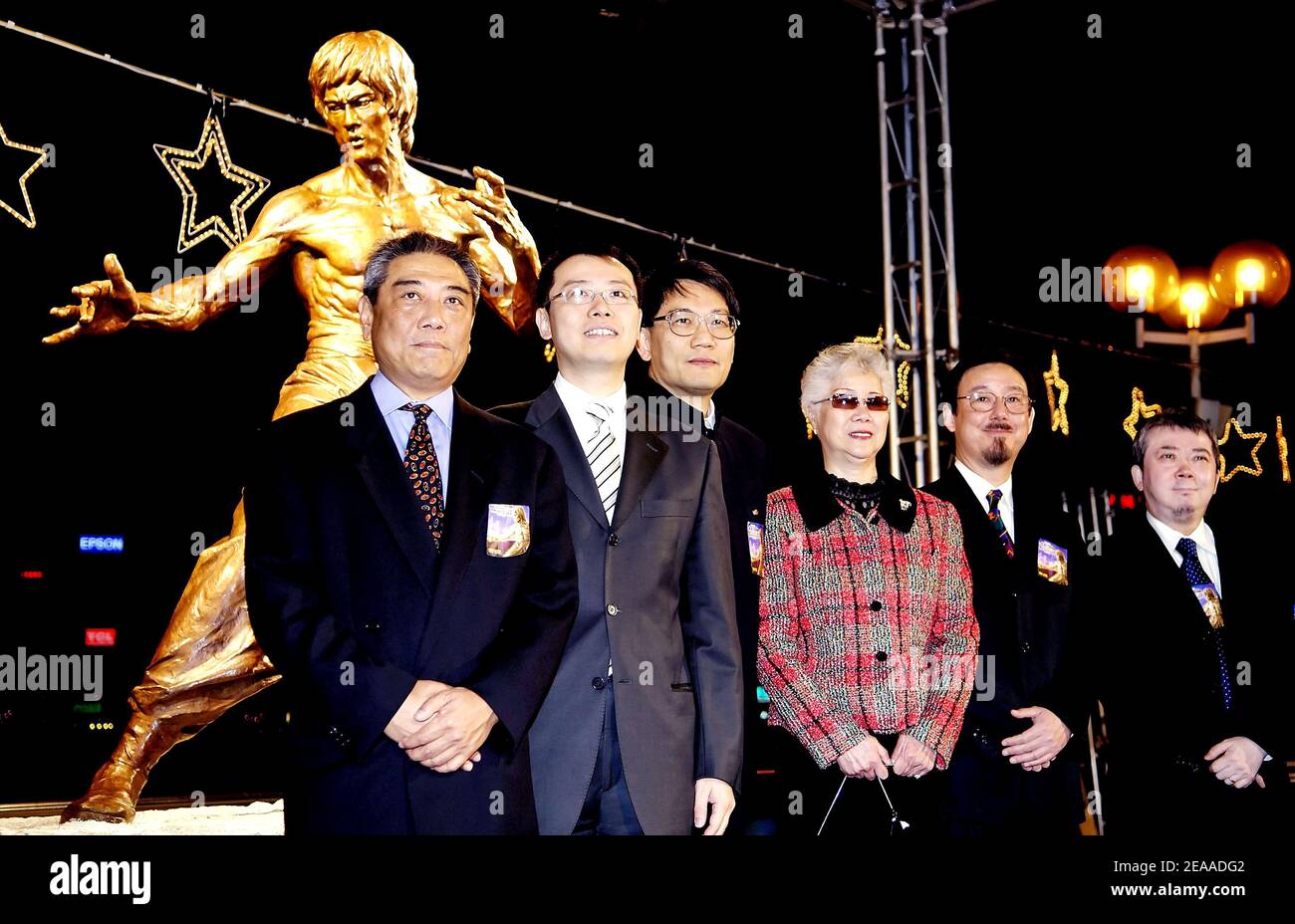 Dignatories from Hong Kong stand with Phoebe Lee (4th from left) Bruce Lee's  sister and Robert Lee (5th from left) Bruce Lee's brother of a bronze  statue of the late Kung-Fu master