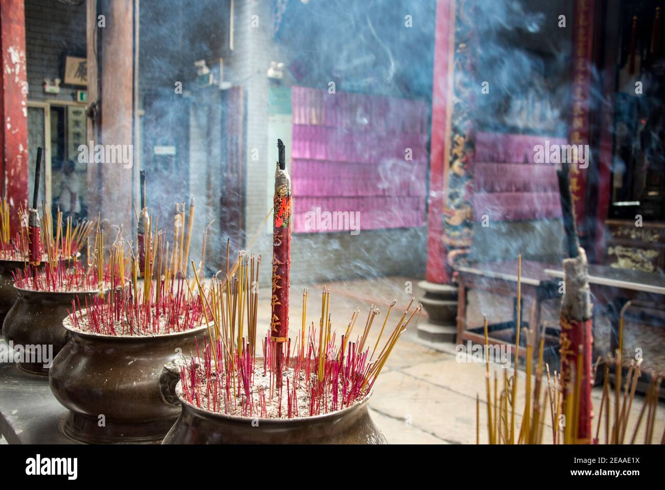 the smoke of incense sticks carries the prayers to heaven, Vietnam Stock Photo