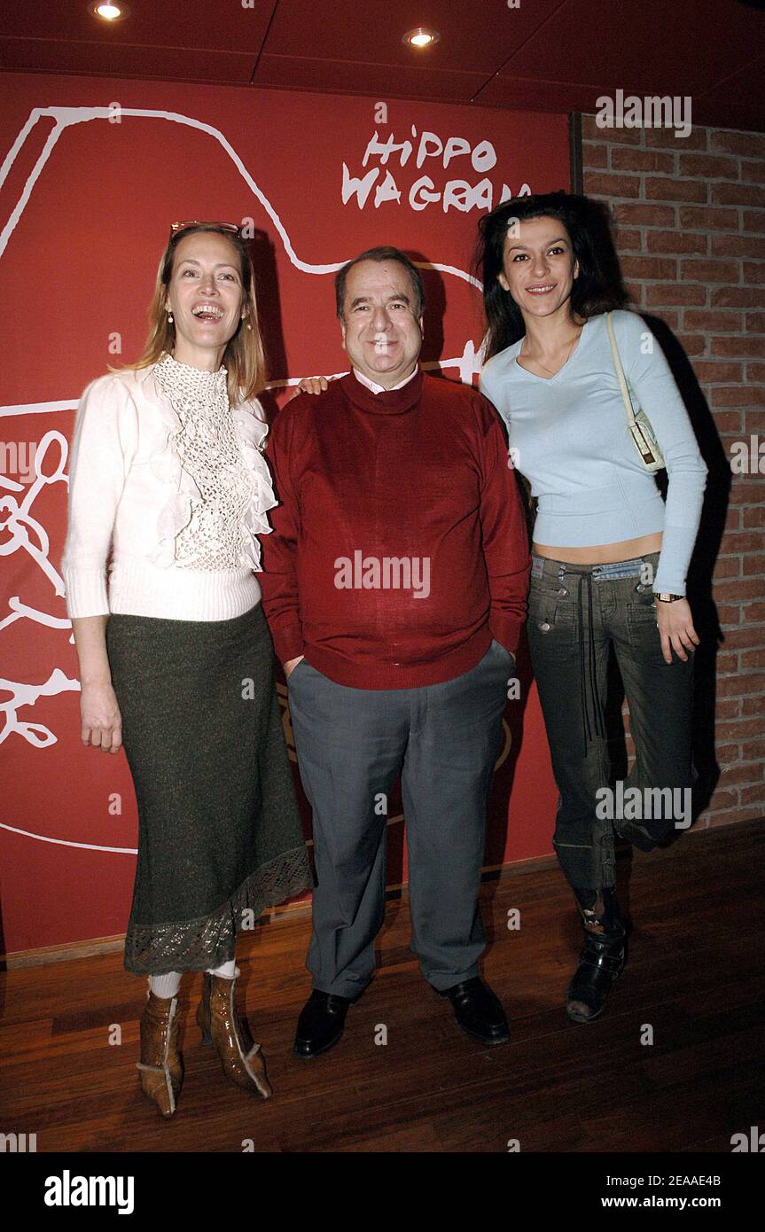 (L-R) French Canadian actress Gabrielle Lazure, French writer PaulLoup Sulitzer and model Jovanka Sopalovic attend the opening party of the new Hippotamus 'Hippo Wagram' restaurant in Paris, France on December 1, 2005. Photo By Giancarlo Gorassini/ABACAPRESS.COM Stock Photo