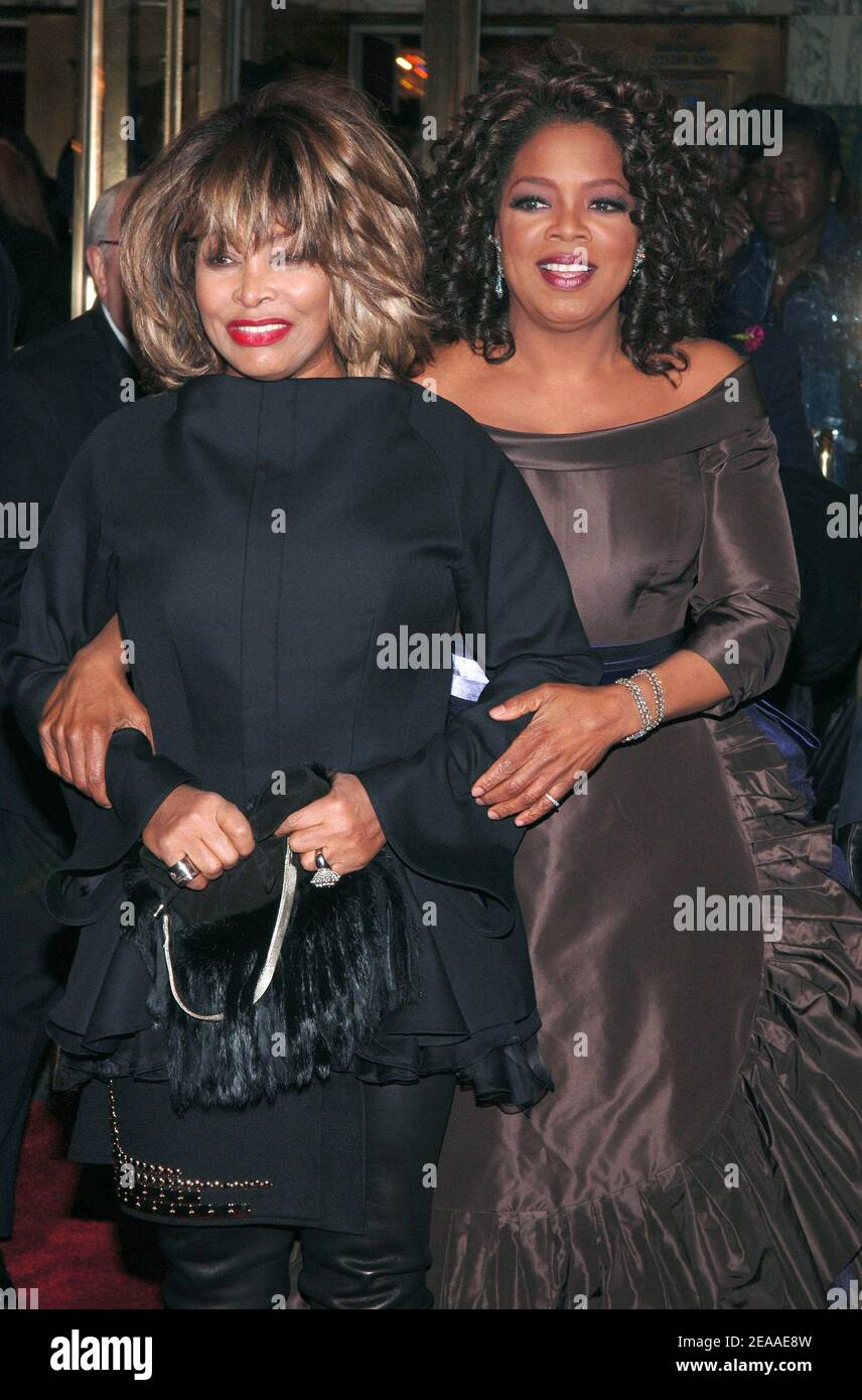 American singer Tina Turner and TV superstar Oprah Winfrey arrive at