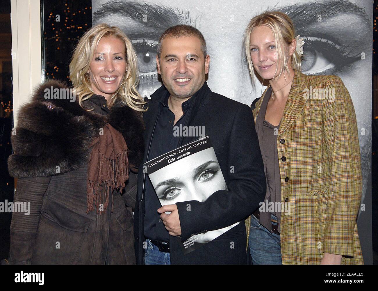 Agathe de La Fontaine and daughter Zoe at the launch party of UNICEF  calendar 2006, with picture of Diane Kruger, photographied by Christophe  Meimoon, held at the Bristol Hotel in Paris, France