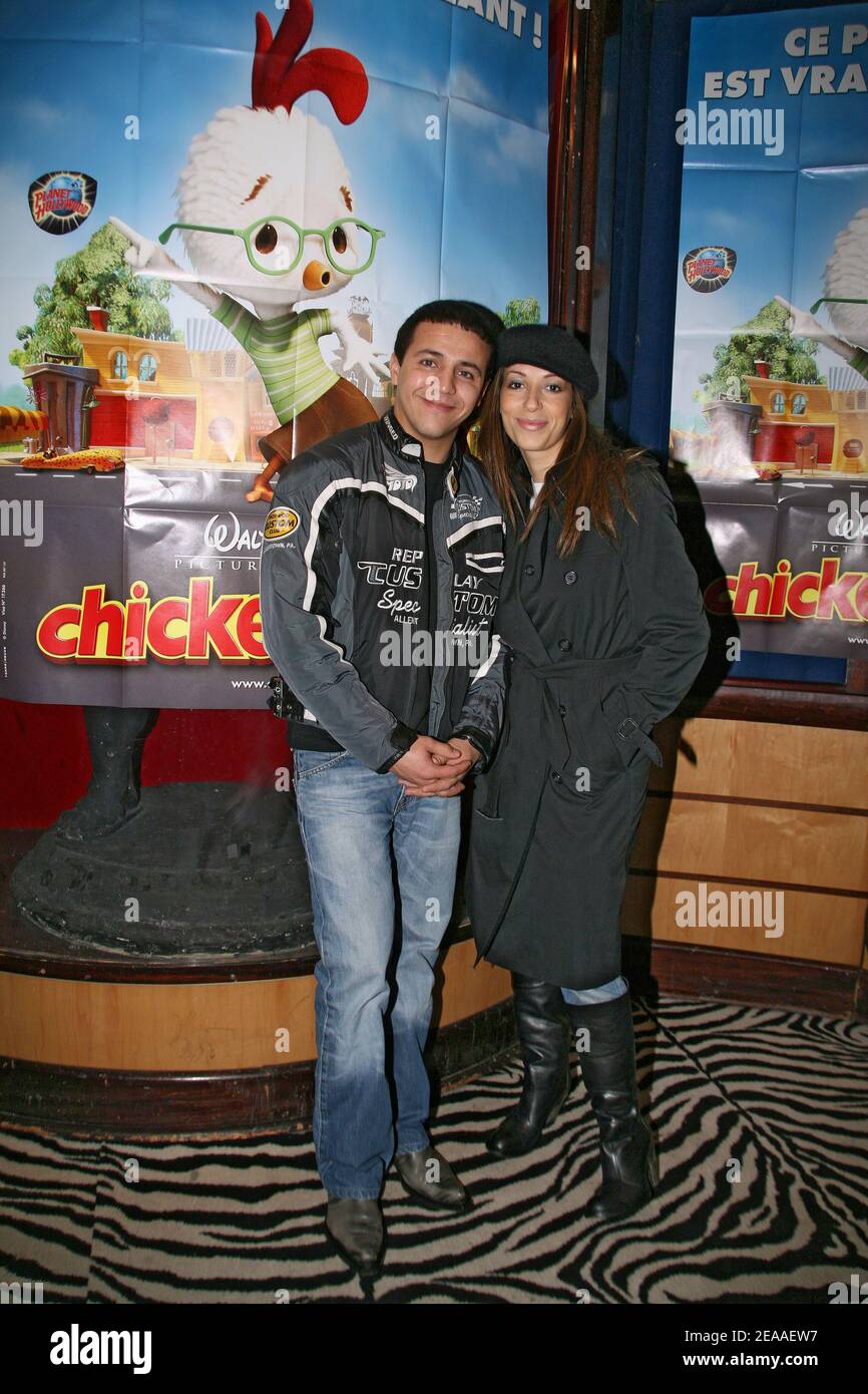 EXCLUSIVE. Singer Faudel with his wife attends the 'Chicken Little' French premiere at the Planet Hollywood restaurant in Paris, France, on December 4, 2005. Photo by Benoit Pinguet/ABACAPRESS.COM Stock Photo