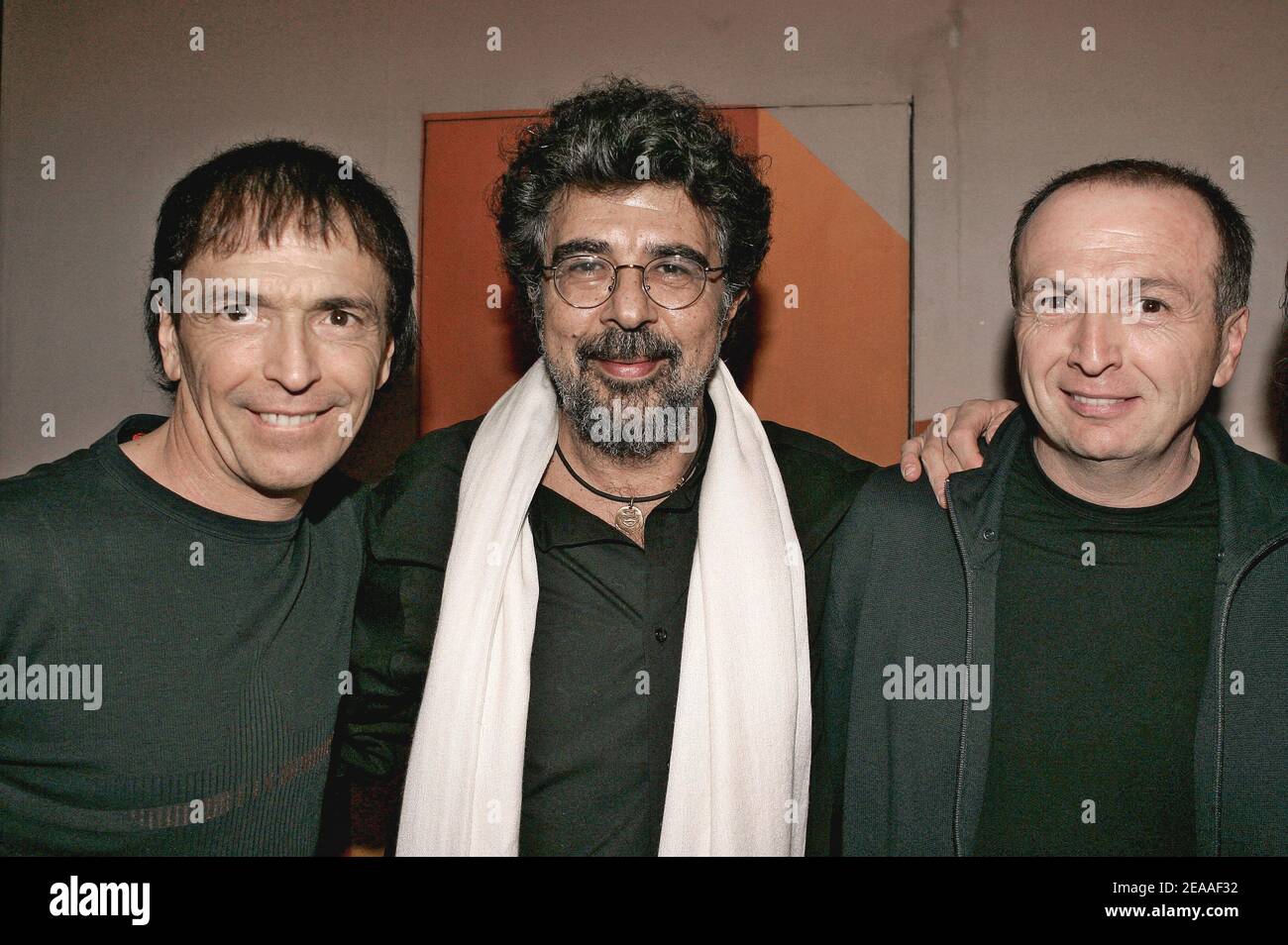 French composer Gabriel Yared (C) poses with Alain and Jean-Francois Bernardini of the group I Muvrini after they received a SACEM Prize during an award ceremony held at the SACEM headquarters in Neuilly near Paris, France, on December 5, 2005. Photo by Laurent Zabulon/ABACAPRESS.COM Stock Photo
