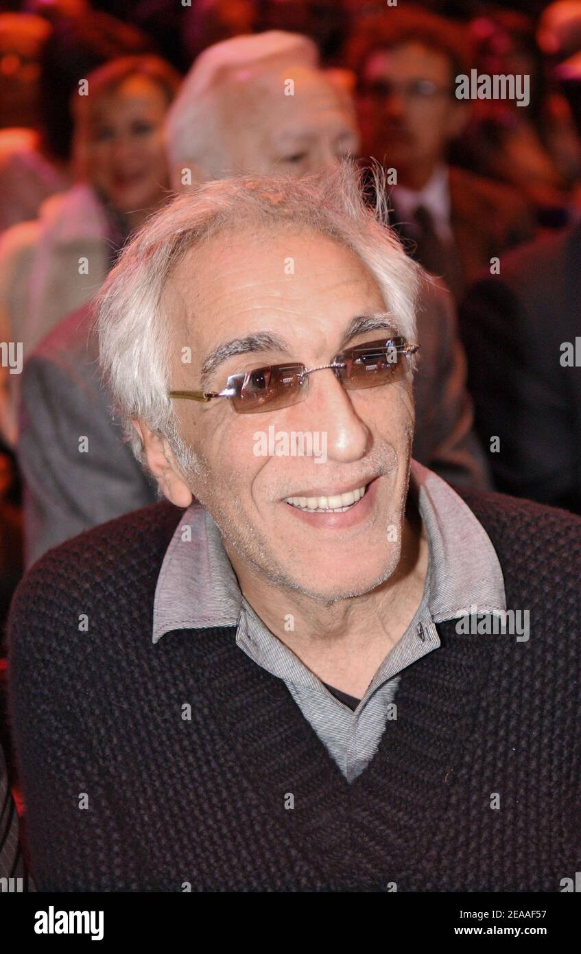 French actor Gerard Darmon attends the boxing fight for the WBA Flyweight title between Frenchman Brahim Asloum and Venezuelan Lorenzo Parra at the Palais Omnisports Paris-Bercy in Paris, France on December 5, 2005. Parra outpoints Asloum to retain his WBA title. Photo by Nicolas Gouhier/CAMELEON/ABACAPRESS.COM Stock Photo