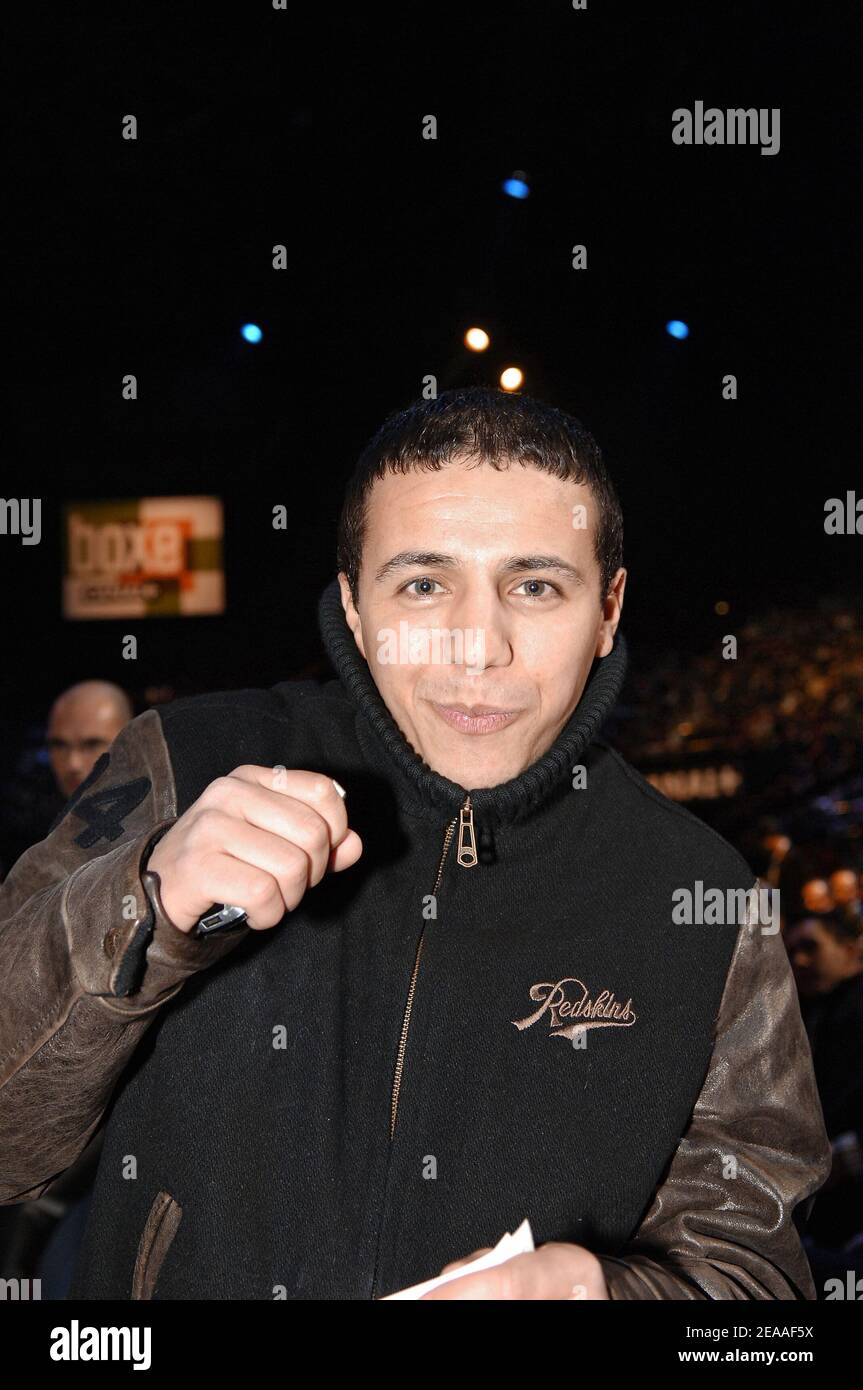 Algerian-born singer Faudel attends the boxing fight for the WBA Flyweight title between Frenchman Brahim Asloum and Venezuelan Lorenzo Parra at the Palais Omnisports Paris-Bercy in Paris, France on December 5, 2005. Parra outpoints Asloum to retain his WBA title. Photo by Nicolas Gouhier/CAMELEON/ABACAPRESS.COM Stock Photo