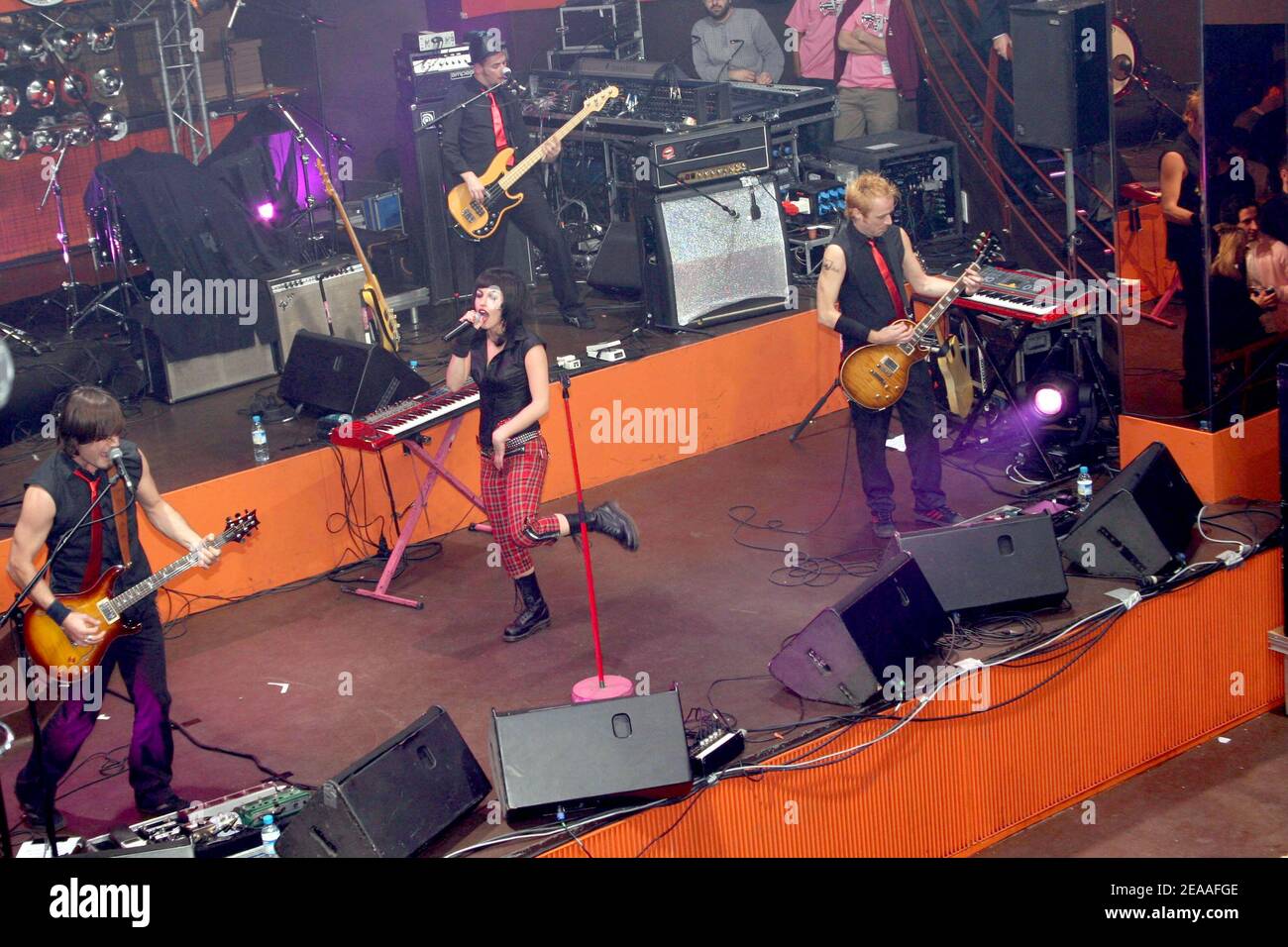 EXCLUSIVE. Superbus singer Jennifer Ayache (Chantal Lauby's daughter) performs live on stage during MTV party at the club 'Le Mix' in Paris, France, on december 6, 2005. Photo by Benoit Pinguet/ABACAPRESS.COM Stock Photo