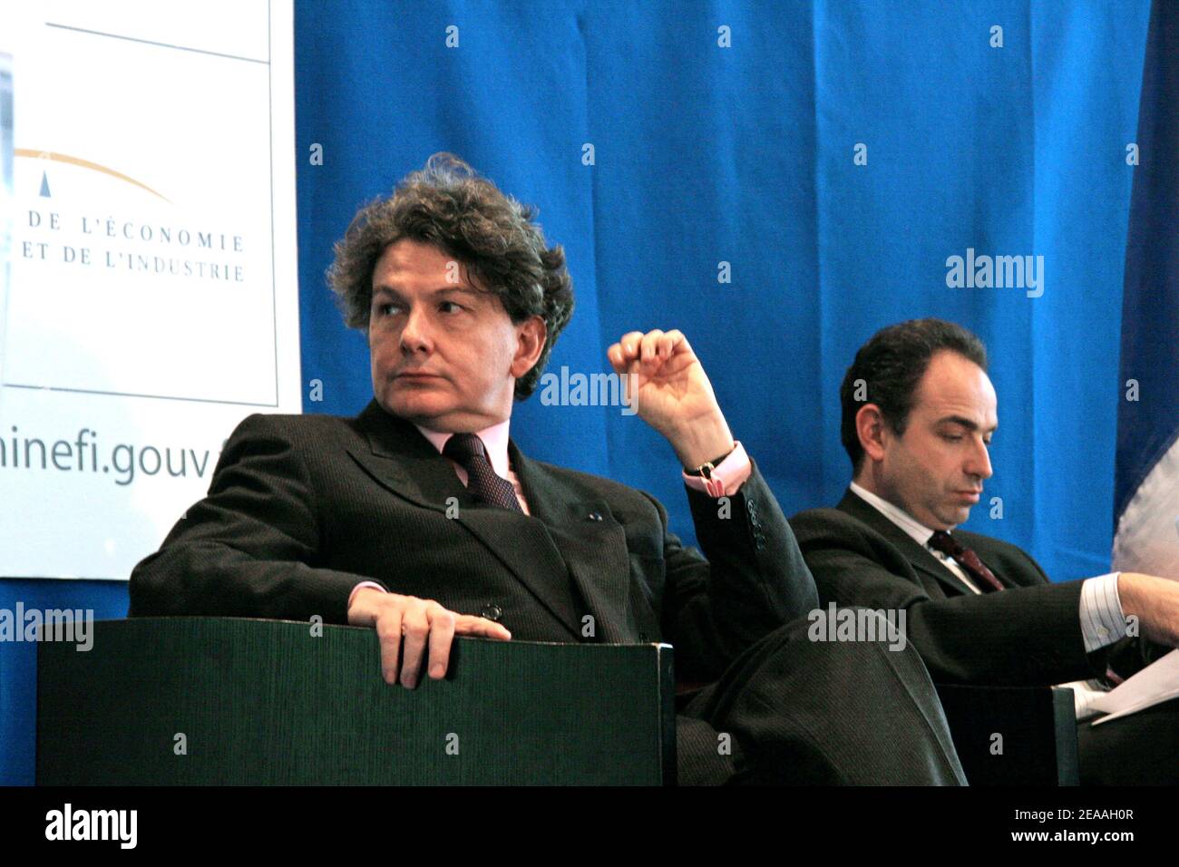 French finances minister Thierry Breton listening BNP Paribas Michel Pebereau, delivering his speech, during a press conference on France public debt at finances minister in Paris, on december 14, 2005. Photo by Denis Guignebourg/ABACAPRESS.COM Stock Photo