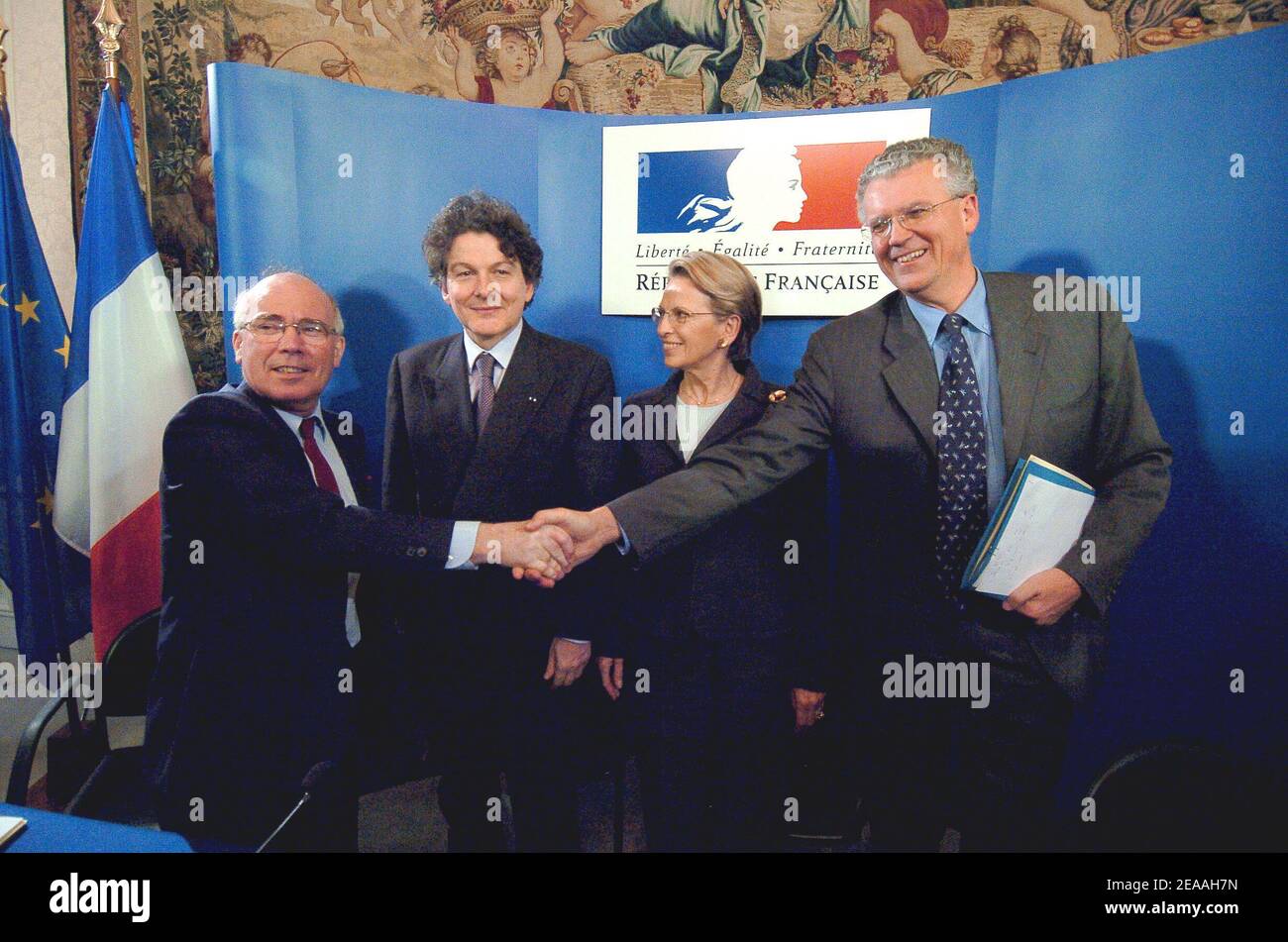(L-R) France's DCN chairman and CEO Jean-Marie Poimboeuf (state owned military shipbuilder), French Minister of the Economy, Finance and Industry Thierry Breton, Defence Minister Michele Alliot-Marie and Thales chairman and CEO Denis Ranque during a joint news conference at the Hotel de Brienne in Paris on December 15, 2005, where they signed a joint declaration of intent with a view to combining the French naval business of Thales and DCN within DCN and the acquisition by Thales of a 25 percent interest in DCN. Photo by Bruno Klein/ABACAPRESS.COM Stock Photo