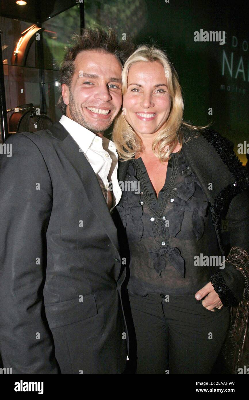 French TV presenter Sophie Favier and her hairdresser Christophe attend jeweller Edouard Nahum's party held at the club 'VIP ROOM' in Paris, France, on December 15, 2005. Photo by Benoit Pinguet/ABACAPRESS.COM Stock Photo
