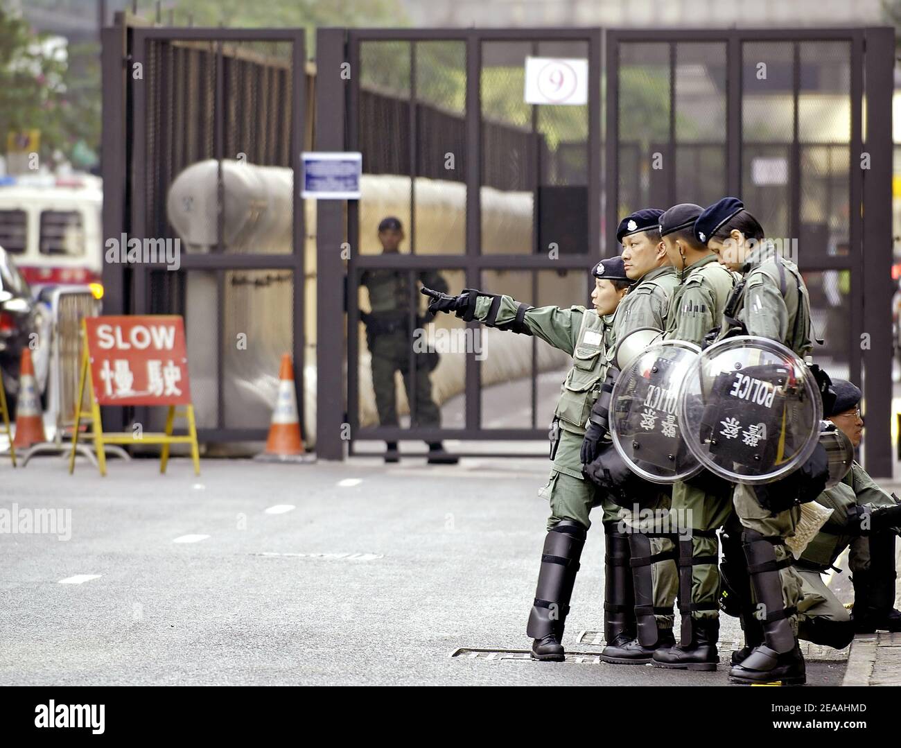 Riot Police prepare for Korean protests outside the Hong Kong Convention Centre where delegates are meeting at the sixth Ministerial Conference of the World Trade Organization on December 17, 2005. The South Koreans have been prominent among demonstrators Stock Photo