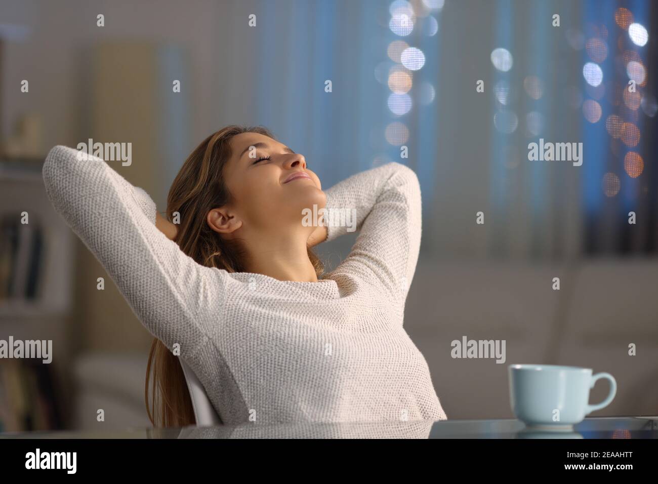 Resting In Chair Woman relaxing in a chair hi-res stock photography and images - Alamy