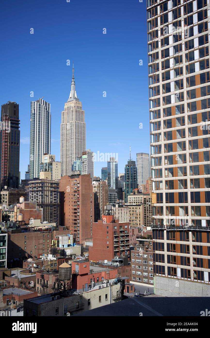 Panorama with high-rise buildings and Empire State Building in midtown Manhattan, New York City Stock Photo
