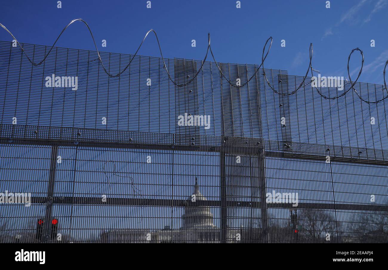 Washington, United States. 08th Feb, 2021. The U.S. Capitol is seen behind barbed wire in Washington, DC on Monday, February 8, 2021. National Guard members remain on duty surrounding the U.S. Capitol after the January 6, 2021 insurrection that left five people dead. Photo by Leigh Vogel/UPI Credit: UPI/Alamy Live News Stock Photo